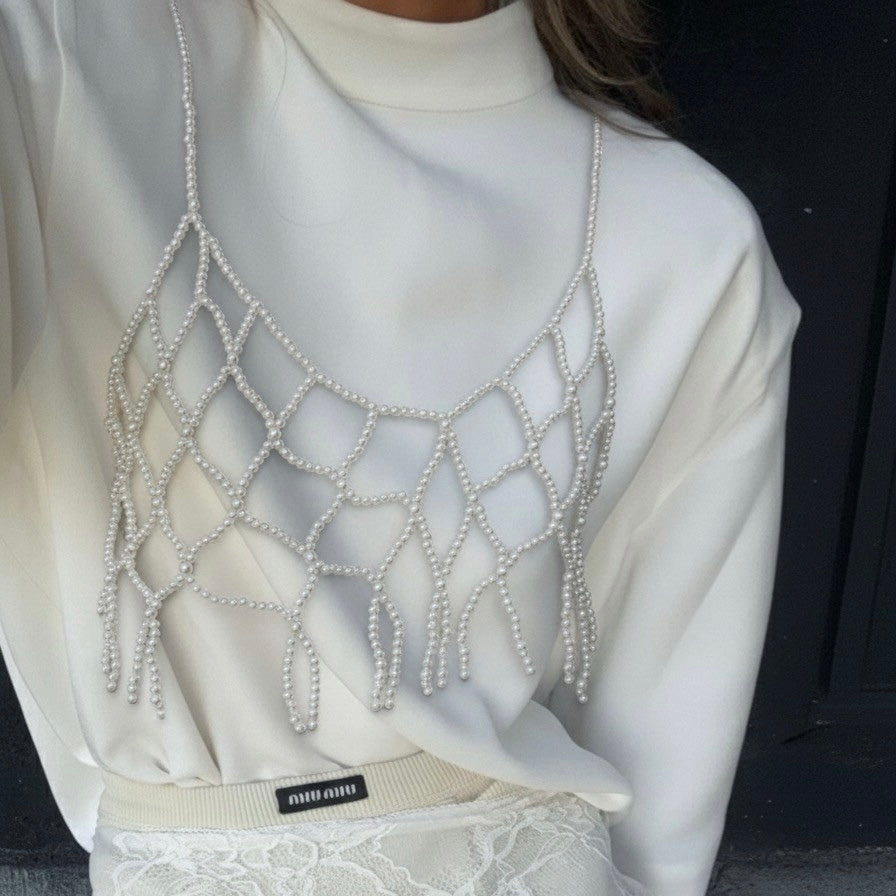 Top de perlas blancas