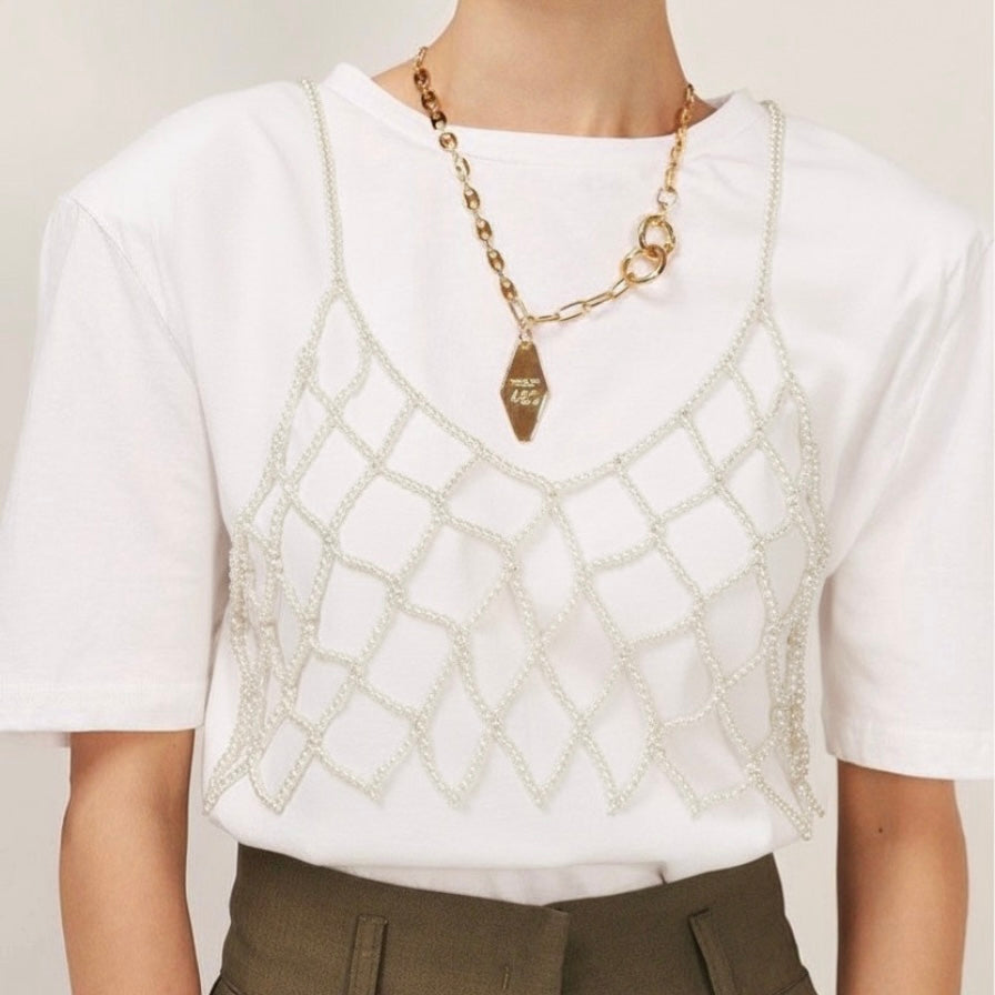 Top de perlas blancas