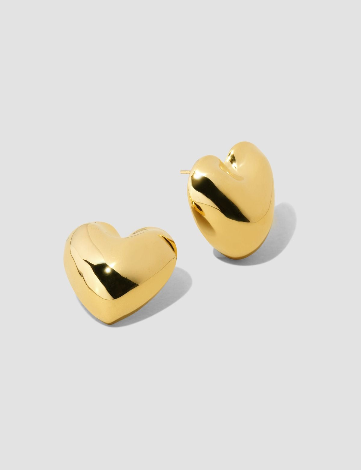 Solid gold heart earrings.