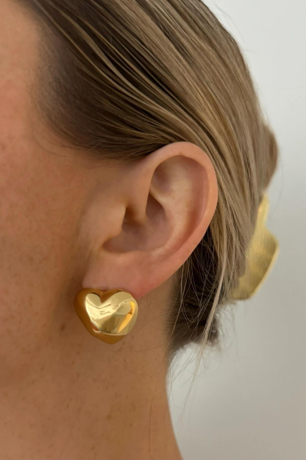Solid gold heart earrings.