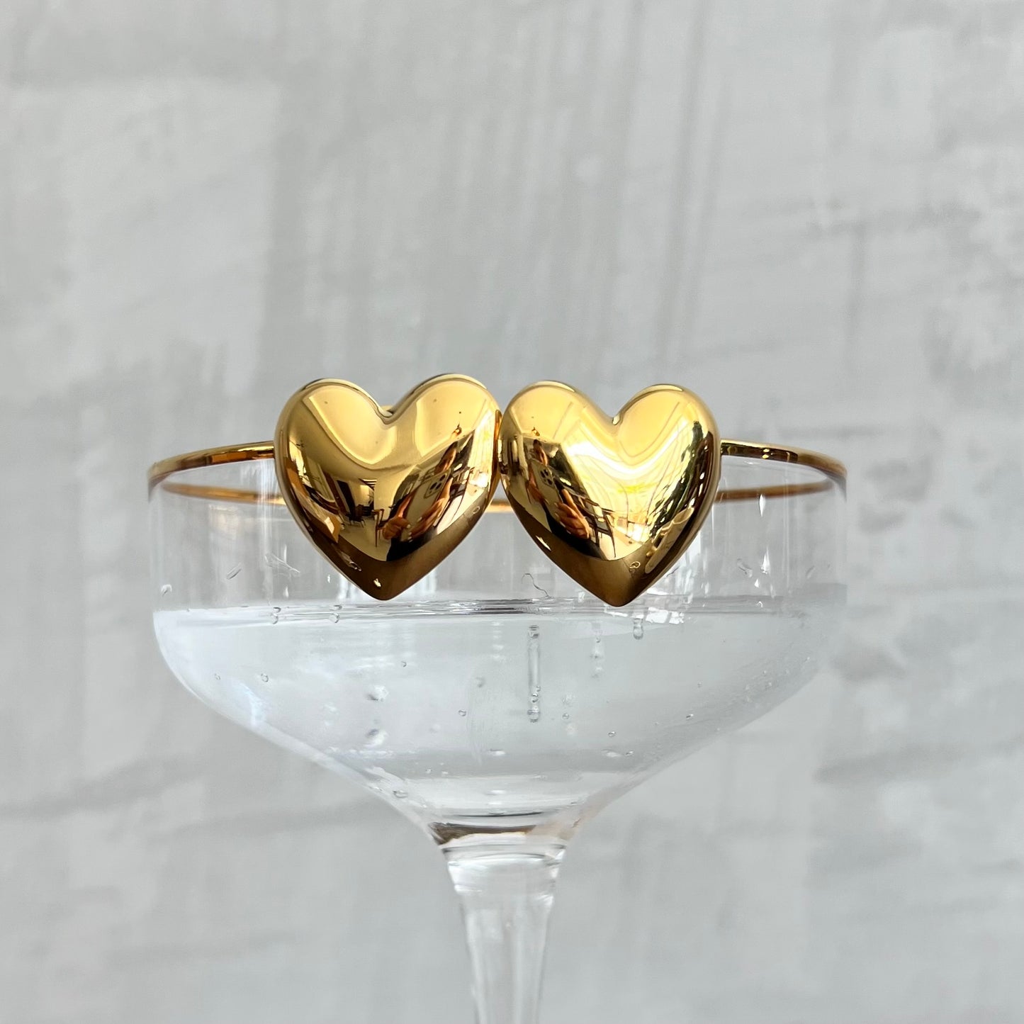 Solid gold heart earrings.