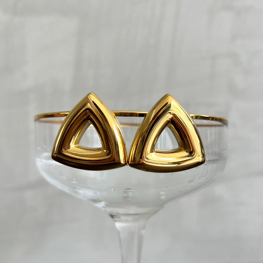 Golden triangle earrings.