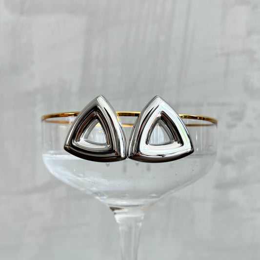 Silver triangle earrings.