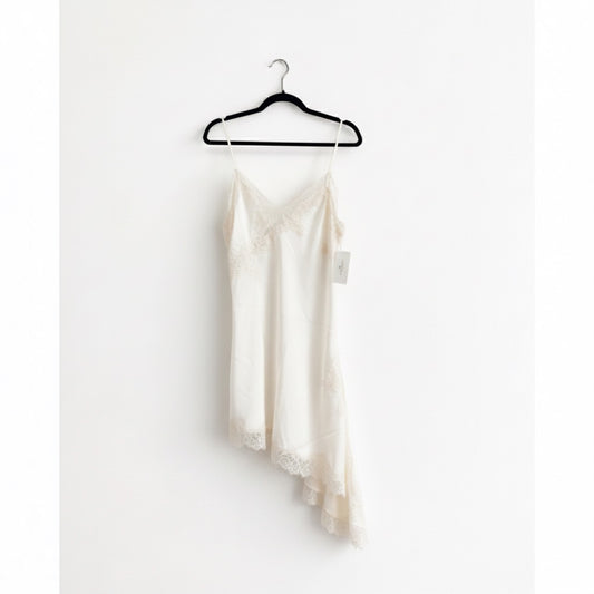 Vestido Blanco Hueso lencero asimétrico